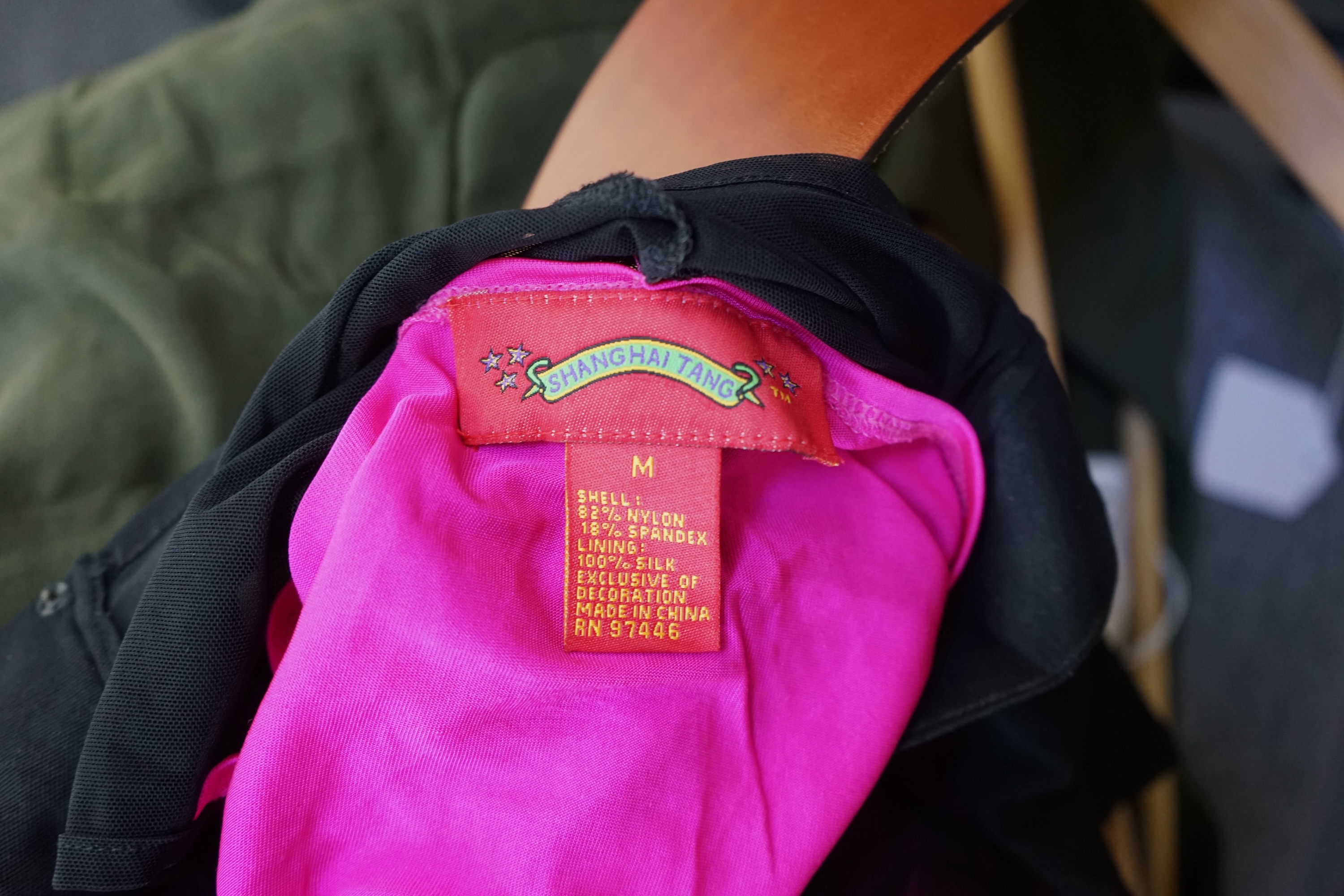 A khaki Cerruti 1881 linen mix short sleeve long shirt, a Shanghai Tang black mesh with pink silk lined sleeveless top and a brown leather Karl Lagerfeld belt, shirt EU 38 and top size M, belt size 8 approx.